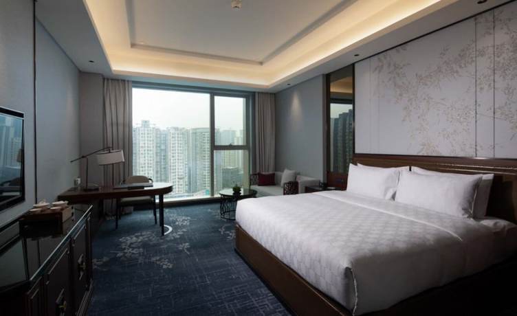 Imagen de la habitación del Hotel Hualuxe Leshan. Foto 2