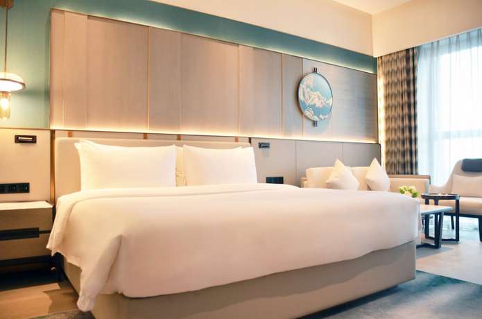 Imagen de la habitación del Hotel Hualuxe Leshan. Foto 3