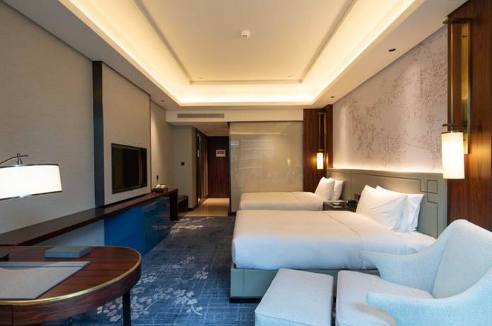 Imagen de la habitación del Hotel Hualuxe Leshan. Foto 8