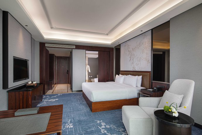 Imagen de la habitación del Hotel Hualuxe Leshan. Foto 9