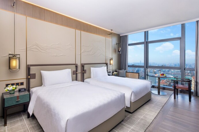 Imagen de la habitación del Hotel Hualuxe Qingdao Licang, An Ihg. Foto 20