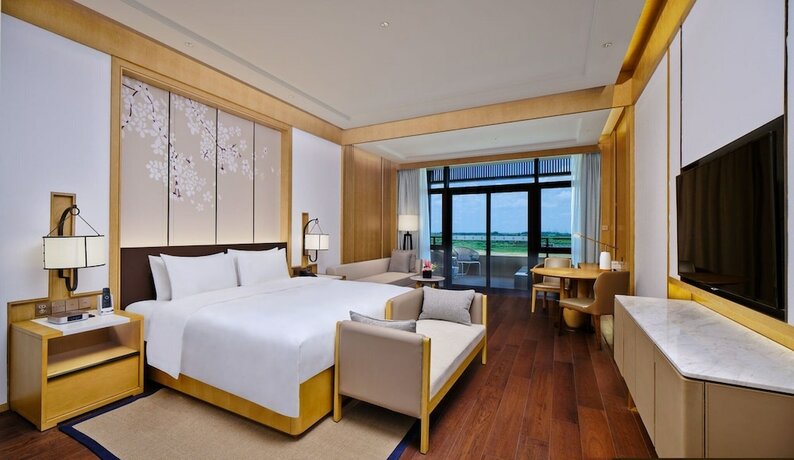 Imagen de la habitación del Hotel Hualuxe Suzhou Bay Hot Spring Resort, An Ihg. Foto 14