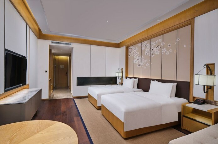 Imagen de la habitación del Hotel Hualuxe Suzhou Bay Hot Spring Resort, An Ihg. Foto 16