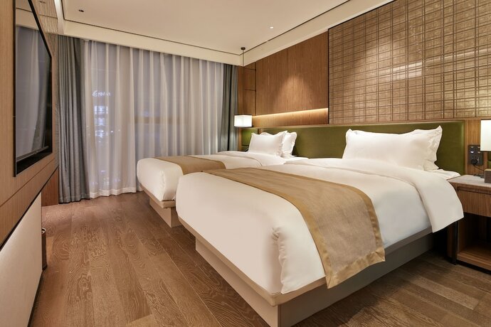 Imagen de la habitación del Hotel Huaman Dongguan Tangxia. Foto 19