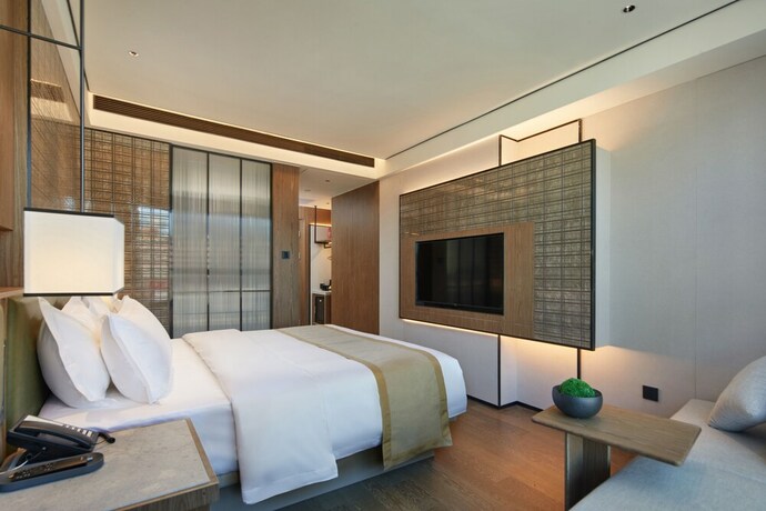 Imagen de la habitación del Hotel Huaman Dongguan Tangxia. Foto 21