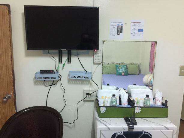 Imagen de la habitación del Hotel Huan Tai. Foto 6