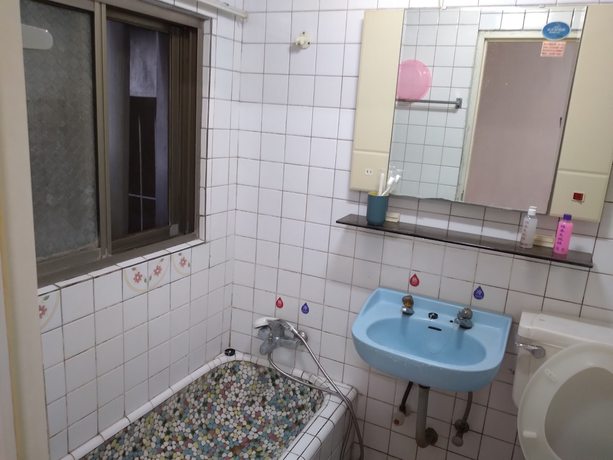 Imagen de la habitación del Hotel Huan Tai. Foto 8