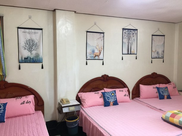 Imagen de la habitación del Hotel Huan Tai. Foto 12