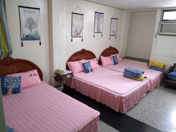 Imagen de la habitación del Hotel Huan Tai. Foto 15