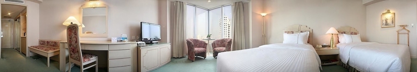Imagen de la habitación del Hotel Huandao Tide. Foto 2