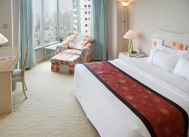 Imagen de la habitación del Hotel Huandao Tide. Foto 6