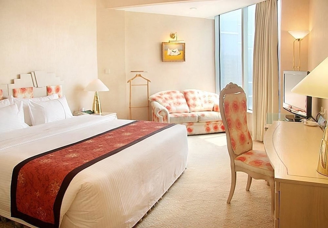 Imagen de la habitación del Hotel Huandao Tide. Foto 9