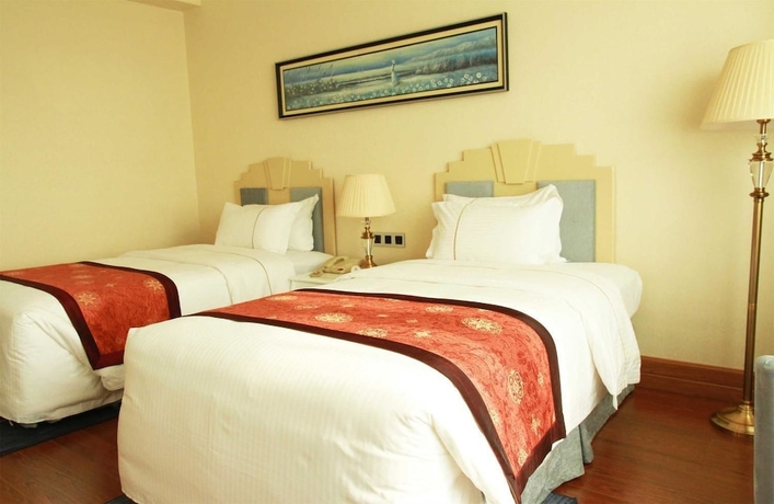 Imagen de la habitación del Hotel Huandao Tide. Foto 10