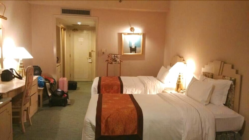 Imagen de la habitación del Hotel Huandao Tide. Foto 15