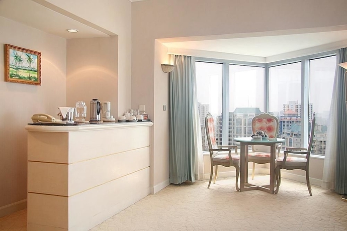 Imagen de la habitación del Hotel Huandao Tide. Foto 17