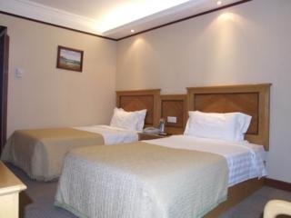 Imagen de la habitación del Hotel Huang Hai. Foto 1