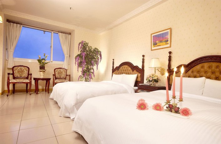 Imagen de la habitación del Hotel Huang Tai. Foto 4