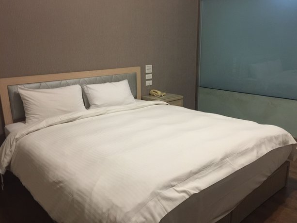 Imagen de la habitación del Hotel Huang Tai. Foto 11