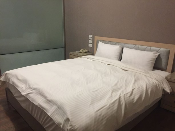 Imagen de la habitación del Hotel Huang Tai. Foto 13