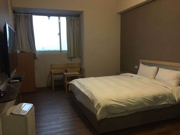 Imagen de la habitación del Hotel Huang Tai. Foto 14