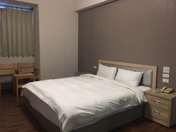 Imagen de la habitación del Hotel Huang Tai. Foto 15