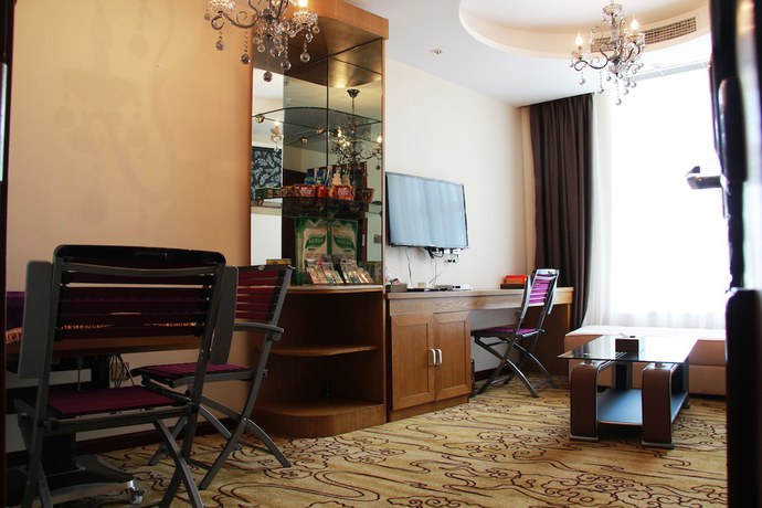 Imagen de la habitación del Hotel Huangguoshuyuquanhotel. Foto 4