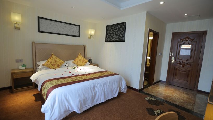 Imagen de la habitación del Hotel Huangguoshuyuquanhotel. Foto 7