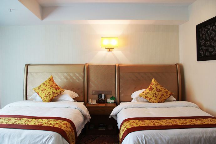 Imagen de la habitación del Hotel Huangguoshuyuquanhotel. Foto 10