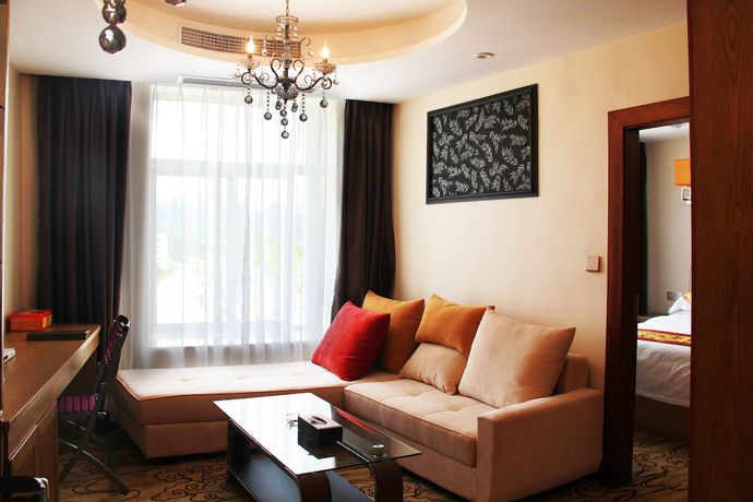 Imagen de la habitación del Hotel Huangguoshuyuquanhotel. Foto 11