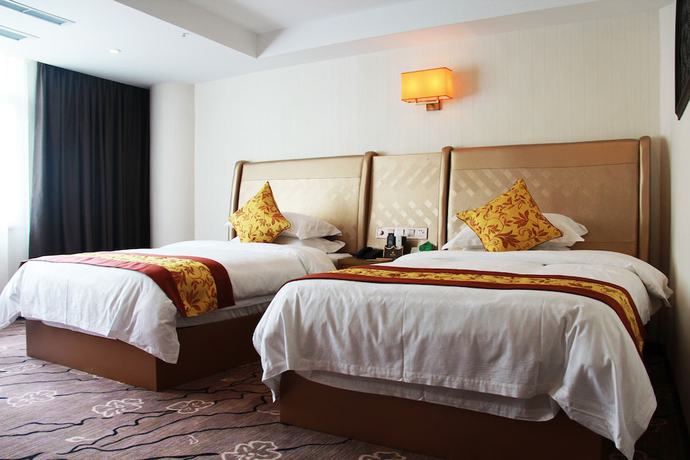 Imagen de la habitación del Hotel Huangguoshuyuquanhotel. Foto 12