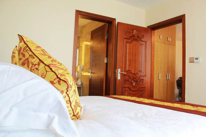 Imagen de la habitación del Hotel Huangguoshuyuquanhotel. Foto 13