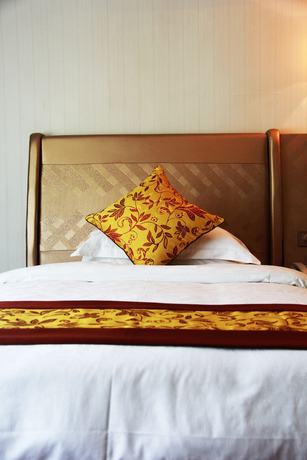 Imagen de la habitación del Hotel Huangguoshuyuquanhotel. Foto 14