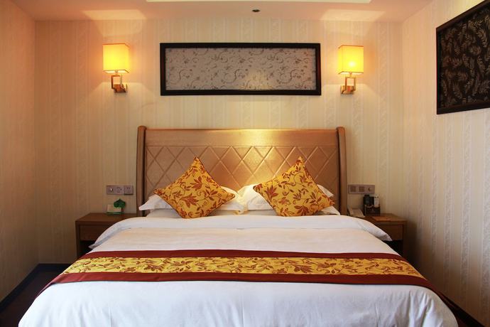 Imagen de la habitación del Hotel Huangguoshuyuquanhotel. Foto 15