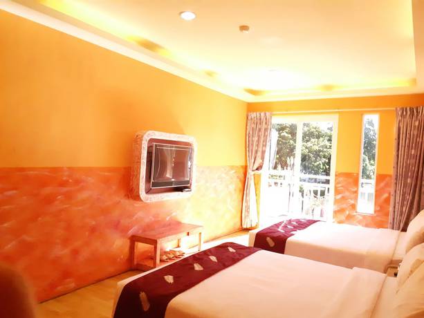 Imagen de la habitación del Hotel Huangjia. Foto 13