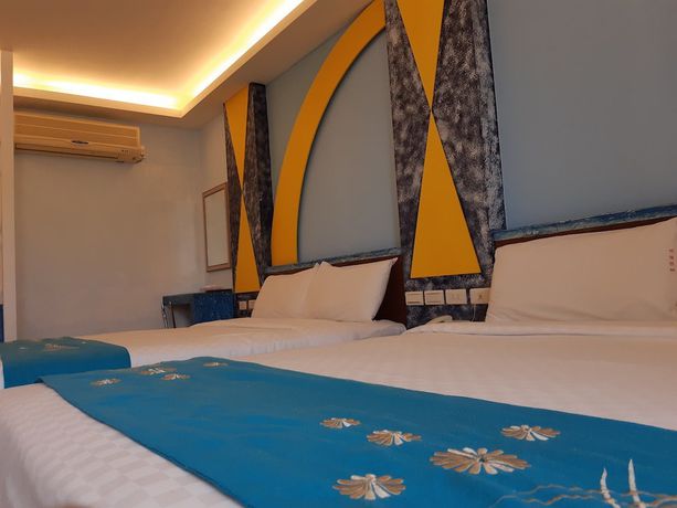 Imagen de la habitación del Hotel Huangjia. Foto 14