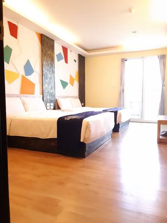 Imagen de la habitación del Hotel Huangjia. Foto 17