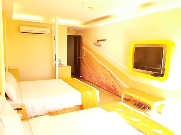 Imagen de la habitación del Hotel Huangjia. Foto 18
