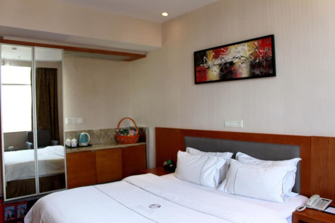 Imagen de la habitación del Hotel Huangpu, Guangzhou. Foto 3