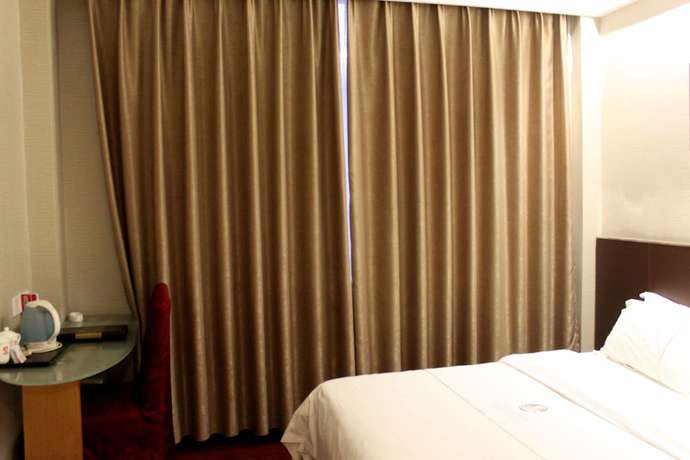Imagen de la habitación del Hotel Huangpu, Guangzhou. Foto 7