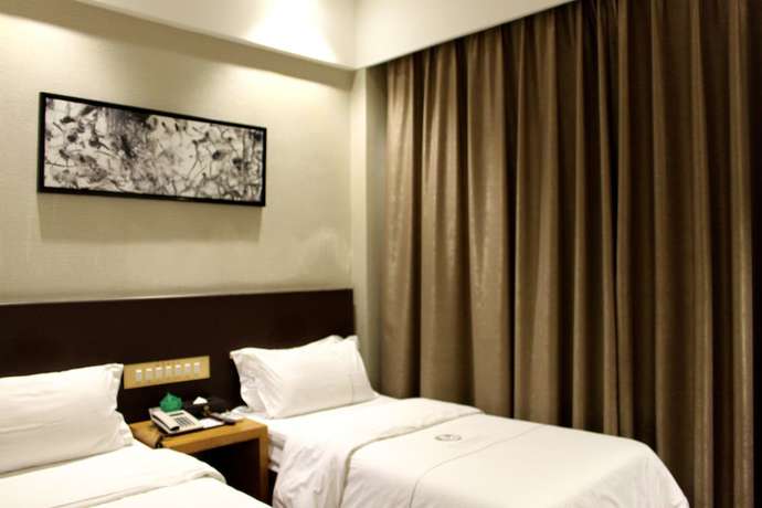 Imagen de la habitación del Hotel Huangpu, Guangzhou. Foto 8