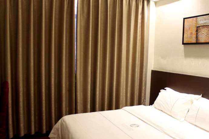 Imagen de la habitación del Hotel Huangpu, Guangzhou. Foto 10