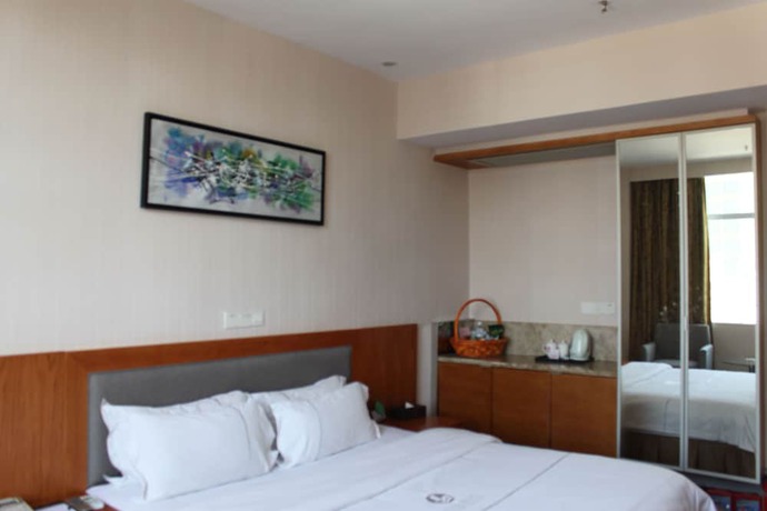 Imagen de la habitación del Hotel Huangpu, Guangzhou. Foto 11
