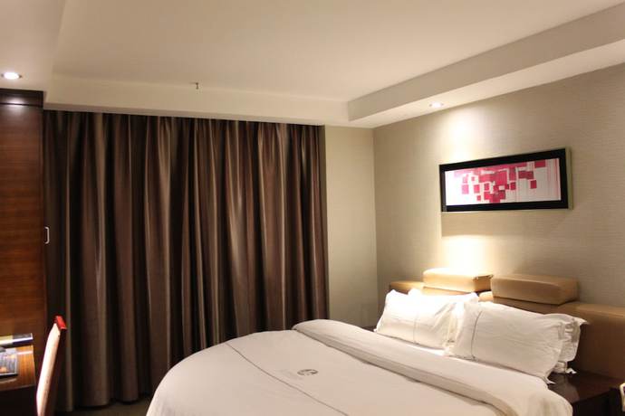 Imagen de la habitación del Hotel Huangpu, Guangzhou. Foto 12