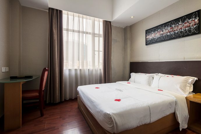Imagen de la habitación del Hotel Huangpu, Guangzhou. Foto 14
