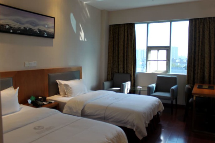 Imagen de la habitación del Hotel Huangpu, Guangzhou. Foto 15