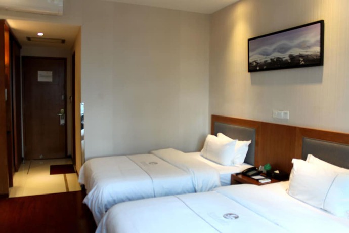 Imagen de la habitación del Hotel Huangpu, Guangzhou. Foto 16