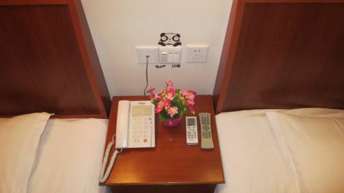 Imagen de la habitación del Hotel Huangshan 8090. Foto 7