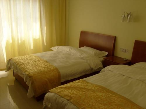 Imagen de la habitación del Hotel Huangshan 8090. Foto 12