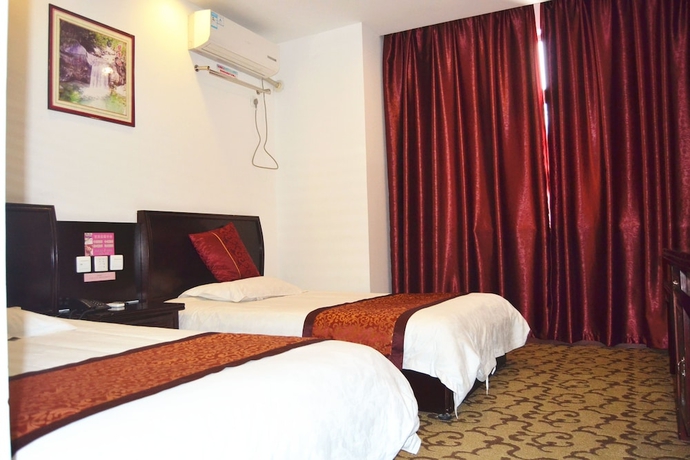 Imagen de la habitación del Hotel Huangshan Baichuan. Foto 4