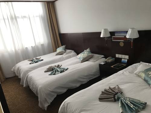 Imagen de la habitación del Hotel Huangshan Baiyun. Foto 4